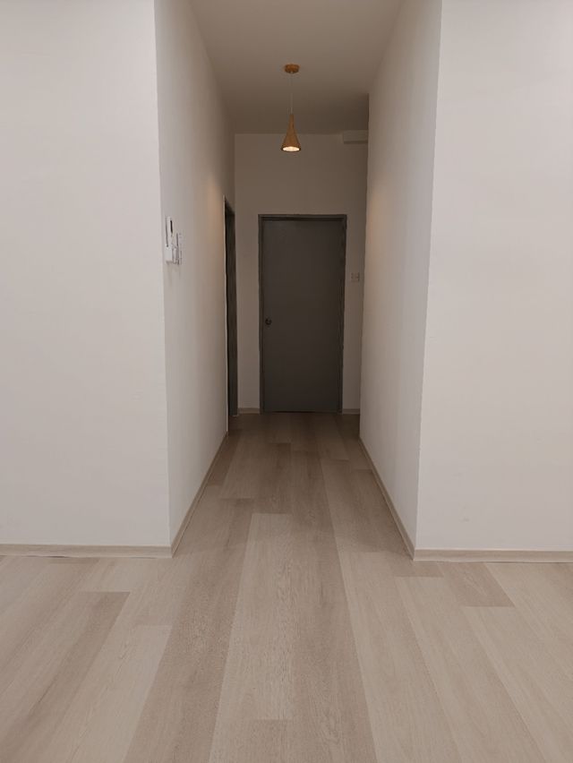 Corridor flooring run — real Chapter One Reno project photo, Kuching