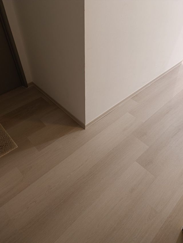 Flooring corner detail — real Chapter One Reno project photo, Kuching