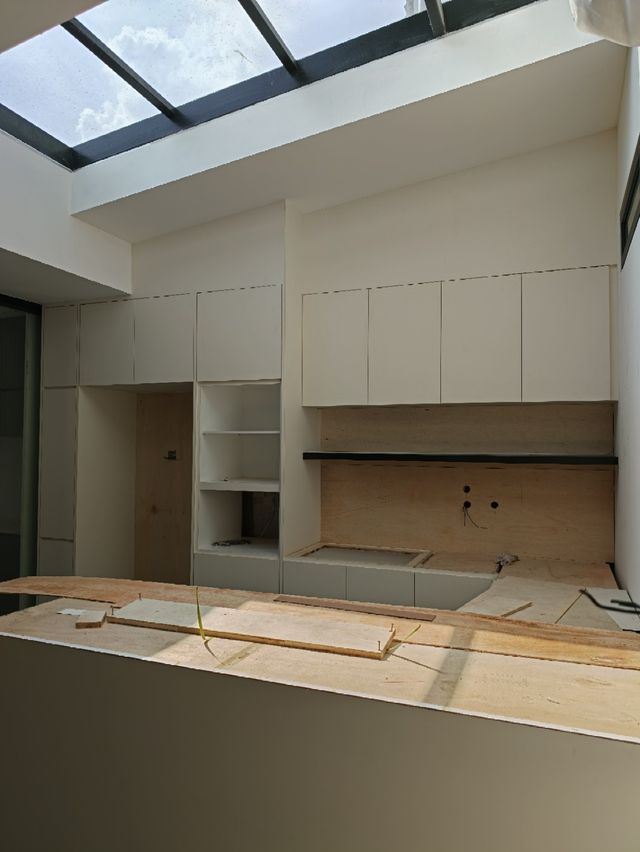 Kitchen cabinetry installation in progress, alternate view, Kuching